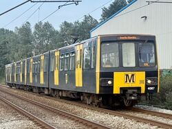 Metrocar 4087 at Benton Square foot crossing