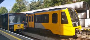 Metrocar 4071 and 555005 at South Gosforth.jpg